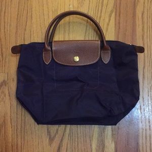 Small purple Longchamp bag